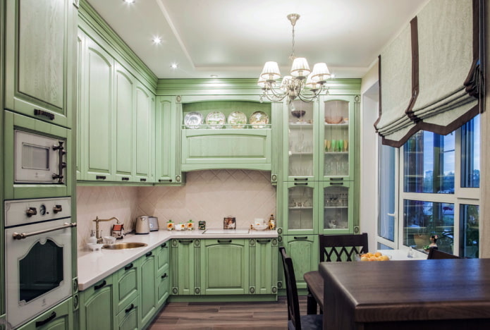 conception de cuisine dans des couleurs vert pâle