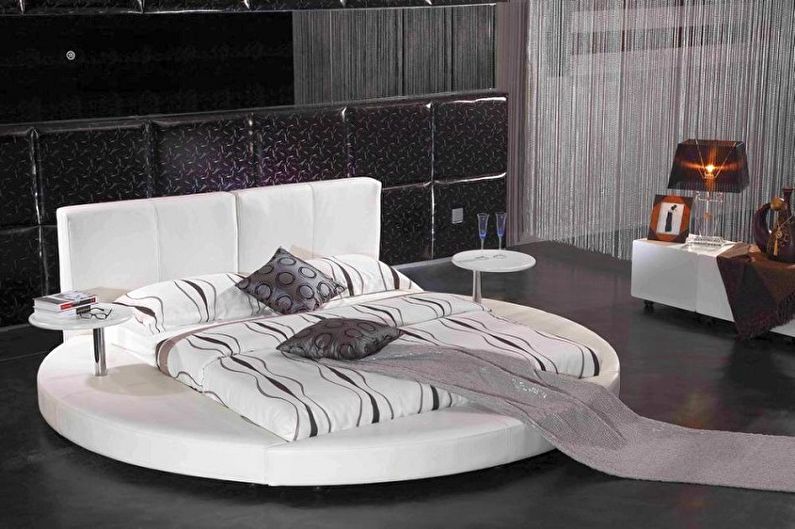 Types de lits ronds dans la chambre - Lit rectangulaire sur un podium rond