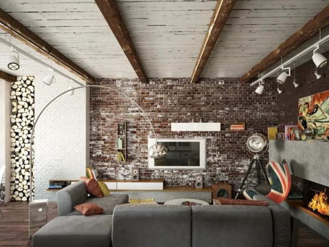 Le mur de briques à l'intérieur du salon est à la mode, pertinent et moderne.  Cette solution donne à la pièce un style et un caractère particuliers.