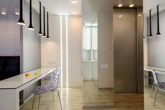 Imitation de briques peintes en blanc dans un appartement typique moderne