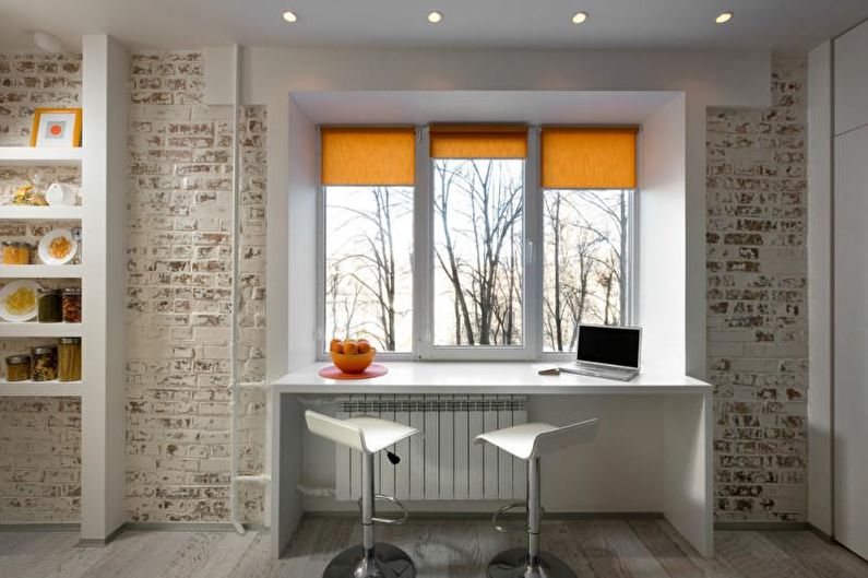 Conception d'un appartement d'une pièce de 33 m².  - Rebord de fenêtre au lieu d'une table