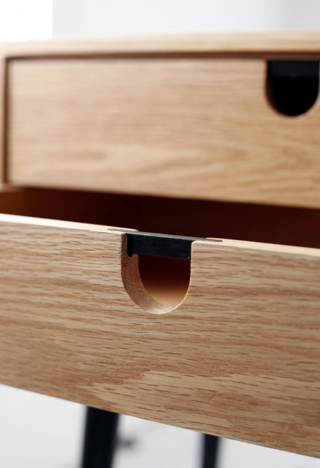 Les poignées de meubles avec des éléments en bois ajoutent une sensation de chaleur et de confort à l'intérieur 
