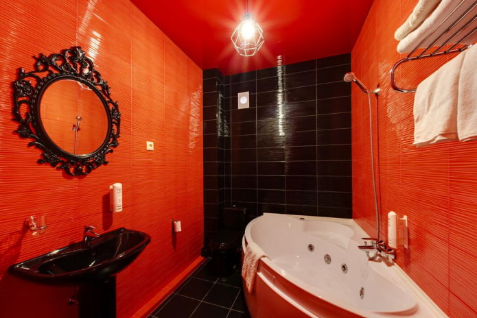 salle de bain dans les tons noir et rouge